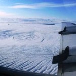 Melting and Refreezing of Deep Greenland Ice Speeds Flow to Sea