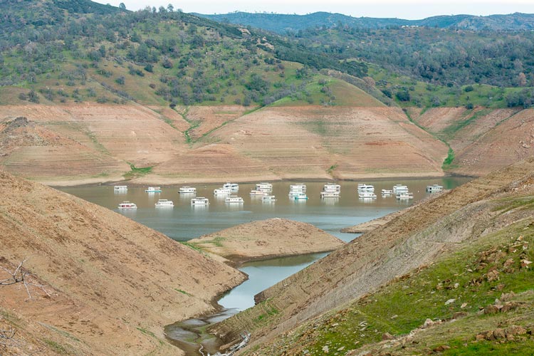 The water level is extremely low at Lake McClure in California on Feb. 4, 2015. Stanford researchers have found that the worst droughts in California have historically occurred when conditions were both dry and warm, and that global warming is increasing the probability that dry and warm years will coincide. (Photo: Florence Low) 